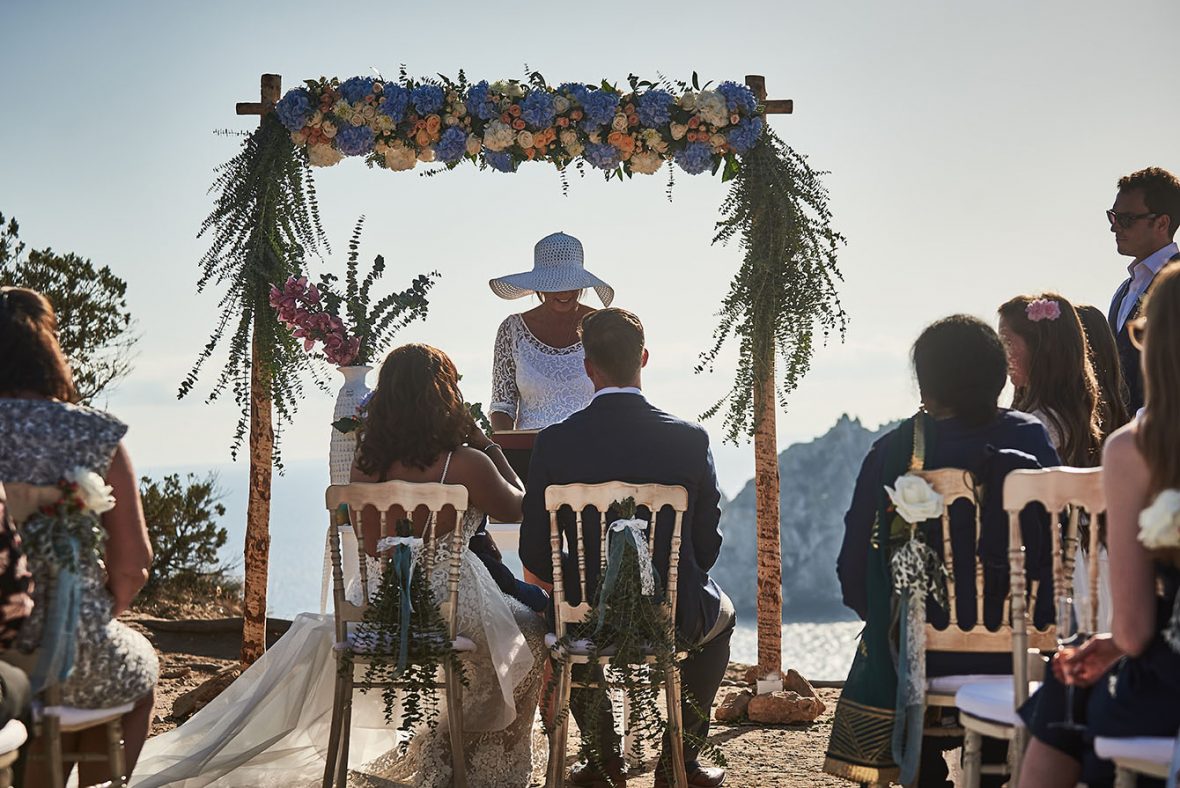 A symbolic blessing on a cliff top Ibiza wedding location