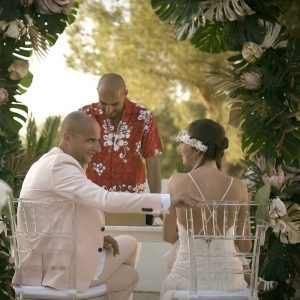villa wedding ceremony: tropical style dresses and flower arch